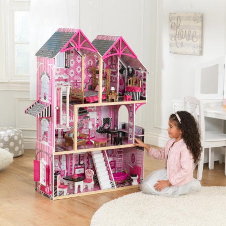 kidkraft casa de muñecas bella 65944 con niña mirándola encantada