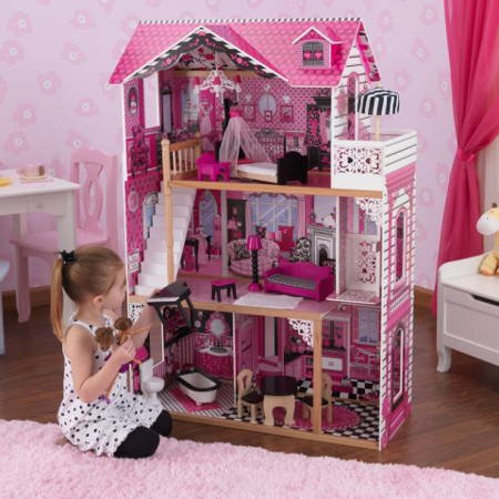 Niña jugando con su kidkraft casa de muñecas amelia 65093